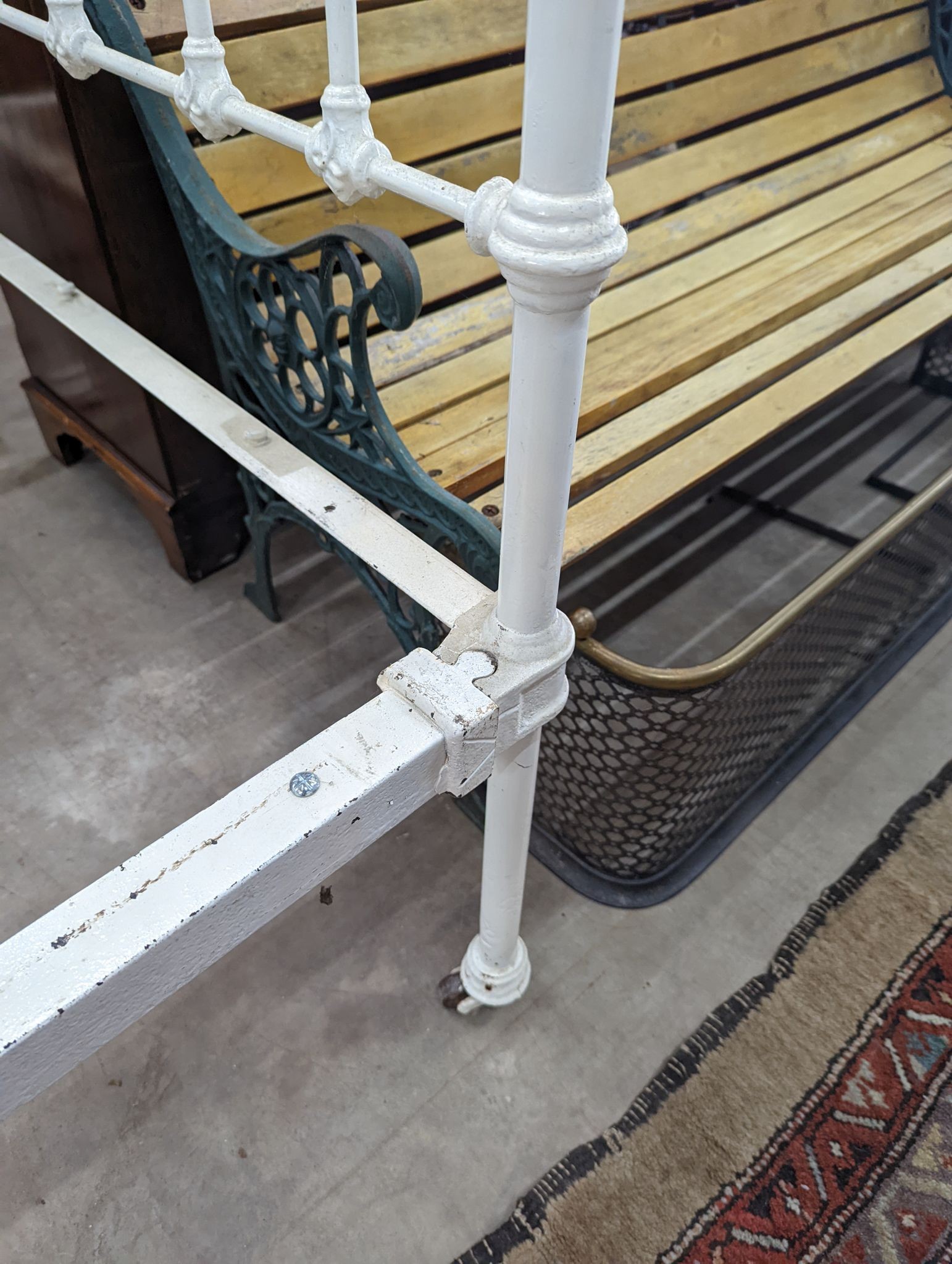 A Victorian painted iron and brass single bedframe, width 120cm, length 200cm